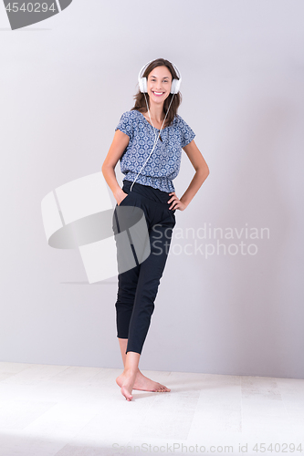 Image of woman with headphones isolated on a white