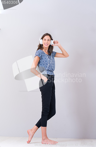 Image of woman with headphones isolated on a white