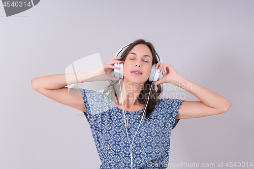 Image of woman with headphones isolated on a white