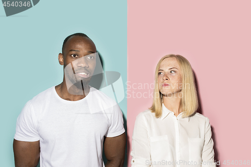 Image of Man and woman posing at studio during quarrel