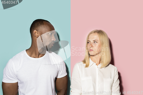 Image of Man and woman posing at studio during quarrel