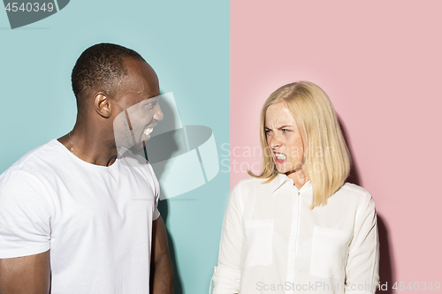 Image of Man and woman posing at studio during quarrel