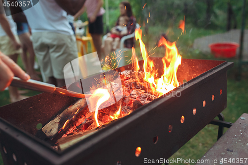 Image of warm fireplace with lots of trees ready for barbecue