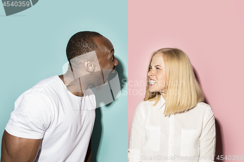 Image of Man and woman posing at studio during quarrel