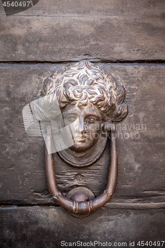 Image of old wooden head door knob