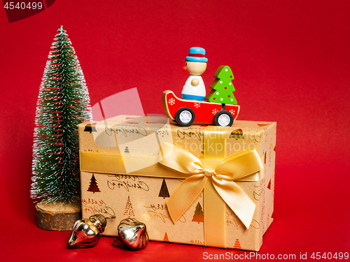 Image of Christmas decoration gift box with red background