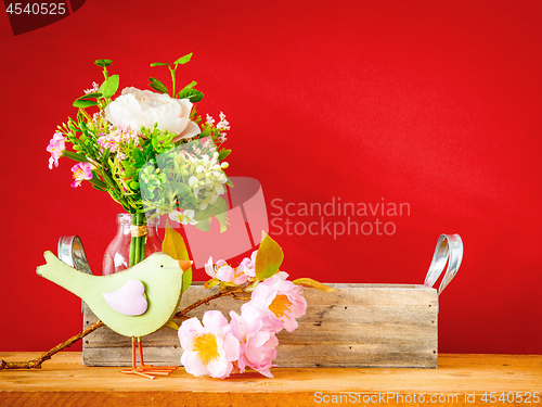 Image of bird with a branch of blossoms easter holiday decoration backgro