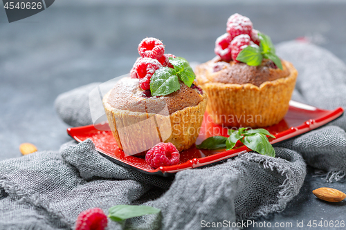 Image of Tartlets with red raspberries and frangipani.