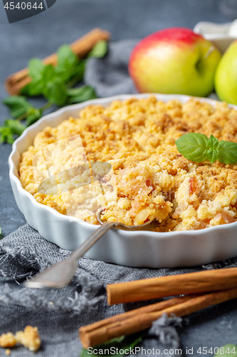 Image of Apple crumble and a dessert spoon closeup.