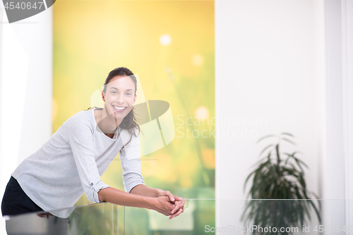 Image of portrait of a young beautiful woman at home