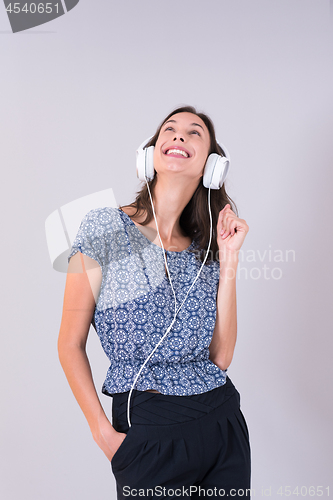 Image of woman with headphones isolated on a white