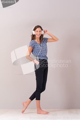 Image of woman with headphones isolated on a white