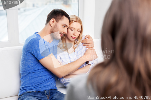 Image of couple hugging at family psychologist office