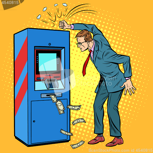 Image of the damaged ATM and the angry man
