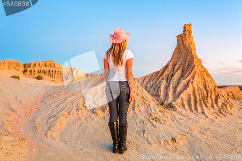 Image of Female walking among the lunette of Mungo National Park