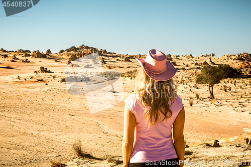 Image of Female tourist visitor looking out to the Mungo Lunettes