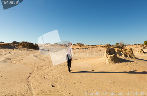 Image of Woman in a desert landscape in outback Australia