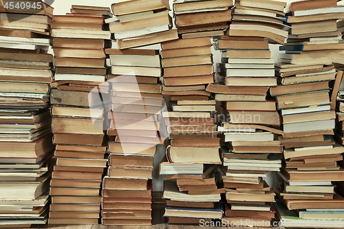 Image of Wall of books piled up