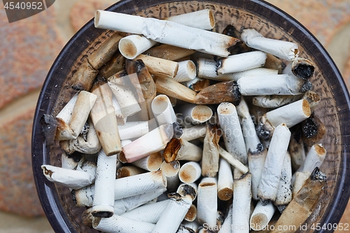 Image of Cigarette buts in an ashtray