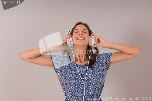 Image of woman with headphones isolated on a white