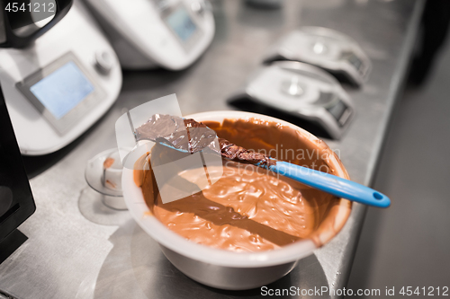 Image of chocolate cream in bowl at confectionery shop