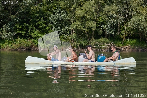 Image of Canoes on the Riverside