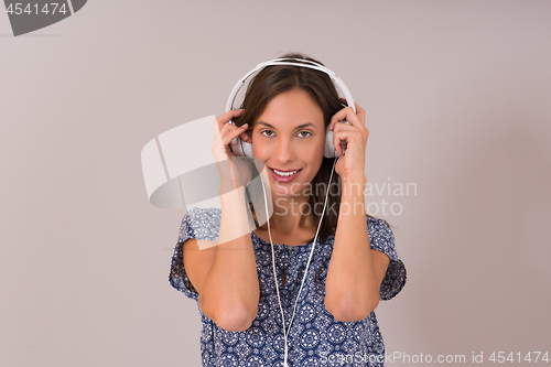 Image of woman with headphones isolated on a white