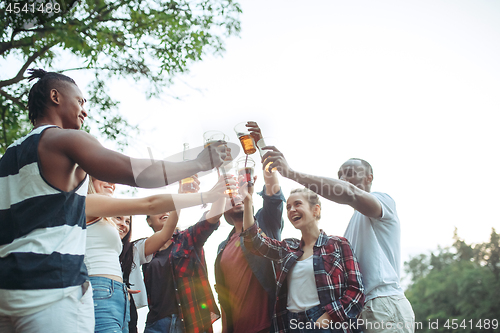 Image of Group of friends making barbecue in the backyard. concept about good and positive mood with friends