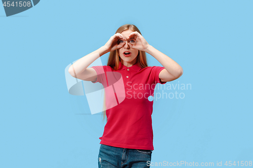 Image of The young beautiful woman looking into the distance