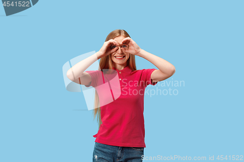 Image of The young beautiful woman looking into the distance