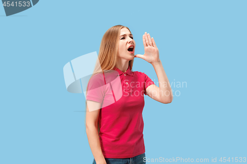 Image of Isolated on pink young casual woman shouting at studio