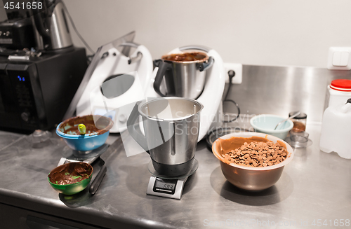 Image of chocolate buttons in bowl at confectionery shop