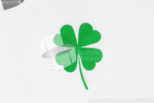 Image of green paper shamrock on white background