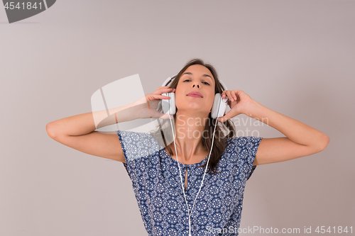 Image of woman with headphones isolated on a white