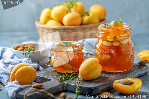 Image of Apricot jam with thyme and almonds.