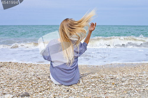 Image of Beautiful girl in sea style on the Adriatic beach. Travel and va