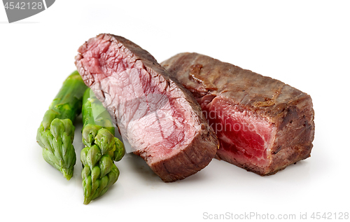 Image of beef wagyu steak meat with asparagus isolated on wight backgroun