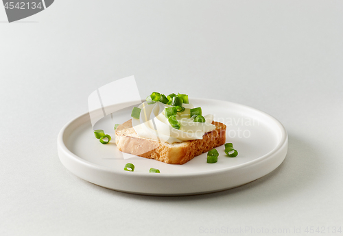 Image of plate of toasted bread with cream cheese