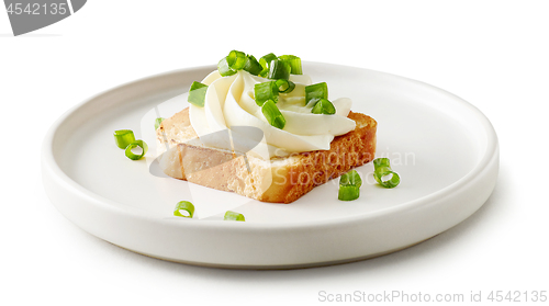 Image of plate of toasted bread with cream cheese