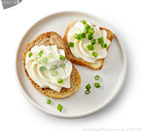 Image of plate of toasted bread with cream cheese
