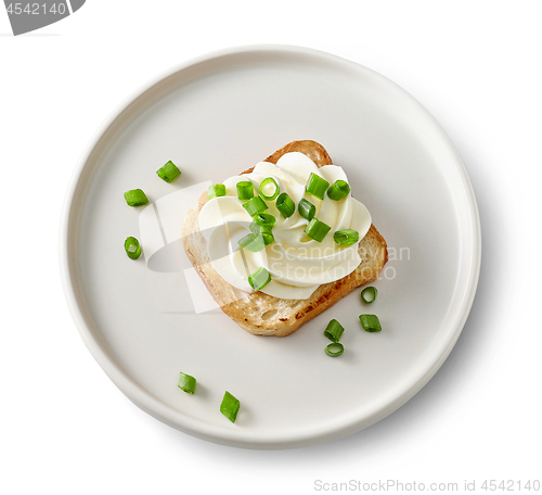 Image of plate of toasted bread with cream cheese