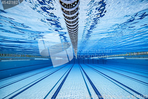 Image of Olympic Swimming pool under water background.