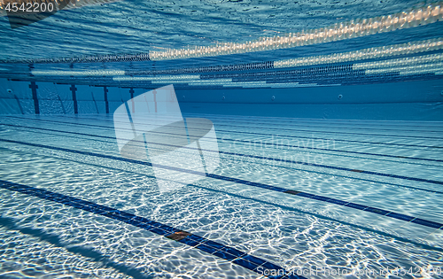 Image of Olympic Swimming pool under water background.