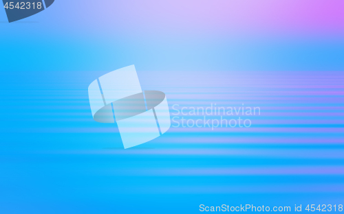 Image of Abstract Motion Blurred Seascape Background In Blue With Pink Gr