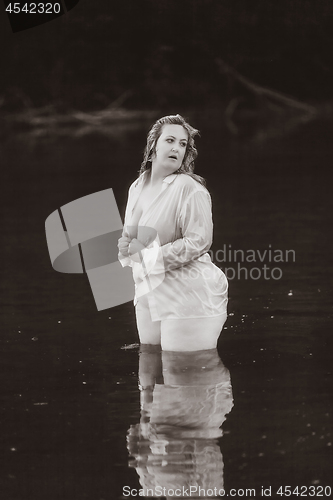 Image of Plus Size Woman in the Lake
