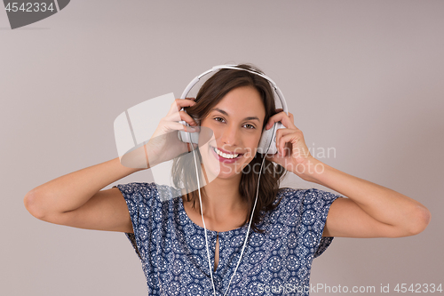 Image of woman with headphones isolated on a white