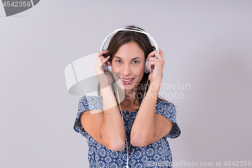 Image of woman with headphones isolated on a white