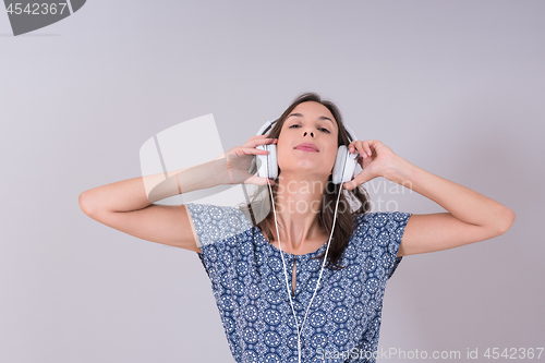 Image of woman with headphones isolated on a white