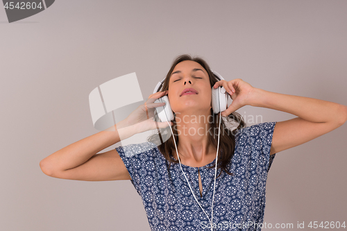 Image of woman with headphones isolated on a white