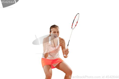 Image of Young woman playing badminton over white background